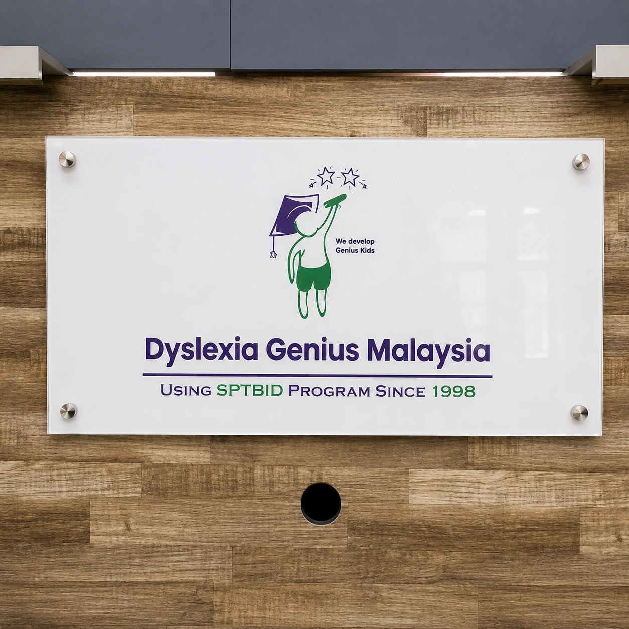 acrylic signage for Dyslexia Genius Malaysia with clean modern design, professional indoor signboard for education center branding in Malaysia