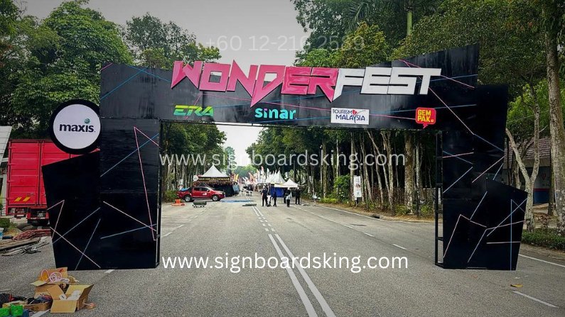 Entry arch signboard for Wonder featuring bold branding design with durable structure, ideal for event entrance and business visibility
