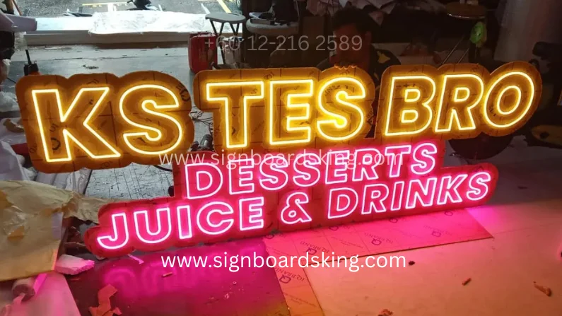Neon LED signboard KS TES BRO dengan pencahayaan terang dan moden, sesuai untuk kedai dan branding perniagaan waktu malam
